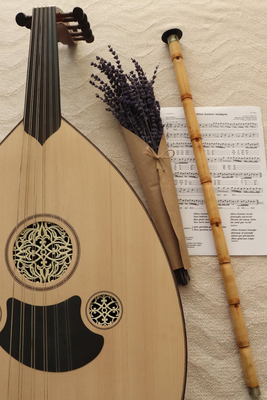 bundle of dried lavender between turkish musical instruments ney flute and oud lute